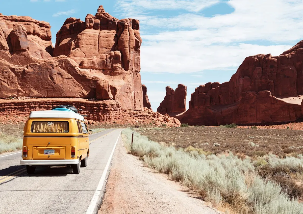 A road winding through red rock canyon country in the American Southwest