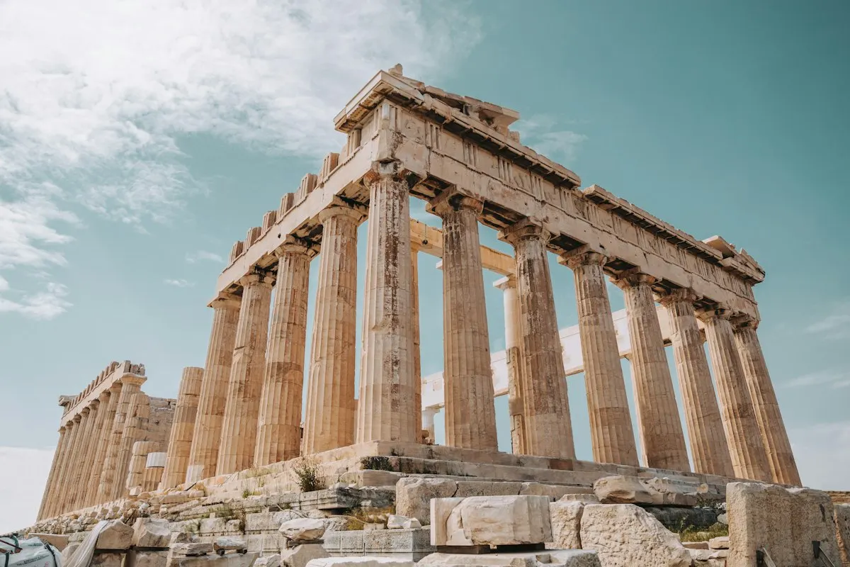 The columns of the Parthenon on the Acropolis in Athens under a blue sky