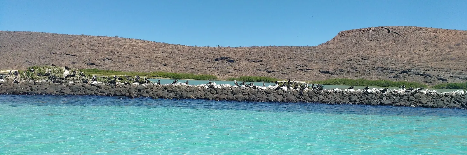Turquoise water and desert hills of Isla Espíritu Santo, Baja California